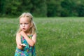 Adorable young girl holding grasshopper Royalty Free Stock Photo