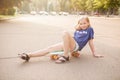Cute young girl with pennyboard outdoors Royalty Free Stock Photo