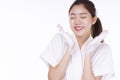 Adorable woman washing her face with foam soap in hand while standing over isolated white background. Skin care and Royalty Free Stock Photo