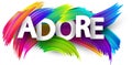 Adore paper word sign with colorful spectrum paint brush strokes over white