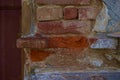 Fragment of old brick wall