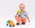 Adorsble baby girl plays with toys Royalty Free Stock Photo