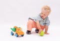 Adorsble baby girl plays with toys Royalty Free Stock Photo