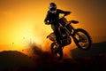 Adrenaline pumping motocross Silhouette with front wheel lifted, action packed adventure