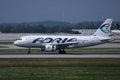 Adria Airways plane taxiing on runway