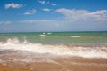 Adriatic Sea coast view. Seashore of Italy, summer sandy beach with clouds on horizon. Royalty Free Stock Photo