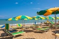 Adriatic Sea coast view. Seashore of Italy, summer umbrellas on sandy beach with clouds on horizon. Royalty Free Stock Photo