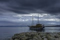 Adriatic Sea with floating ship - Brela, Croatia Royalty Free Stock Photo