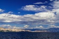 Adriatic sea, mountains and hills. Blue sky with white clouds Royalty Free Stock Photo