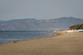 Adriatic sea sandy beach and hill mountain on background
