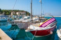 Adriatic sea shore with small leisure boats inside the harbor of Makarska City