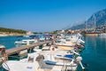 Adriatic sea shore with small leisure boats inside the harbor of Makarska City