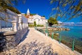 Adriatic town of Opatija watefront walkway and church view Royalty Free Stock Photo