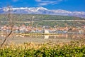 Adriatic town of Posedarje and small island church view