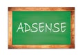 ADSENSE text written on green school board