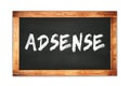 ADSENSE text written on wooden frame school blackboard