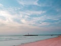 Adstract color of pink beach in blue sky brith sunset at the beach. dramatic gray cloudy sky above sea water