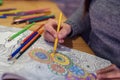 Adult antistress colouring book with colorful pencils