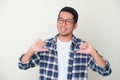 Adult Asian man smiling happy while pointing to his self Royalty Free Stock Photo
