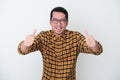 Adult Asian man wearing yellow flannel shirt give two thumbs up Royalty Free Stock Photo