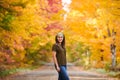 Asian woman in autumn forest