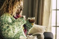 Adult beautiful caucasian woman at home sick with ill and cold drinking  hot tea - fever and seasonal influenza illness concept Royalty Free Stock Photo