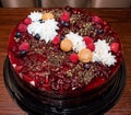 Adult birthday cake made of chocolate and fruit