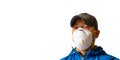 An adult male worker is wearing an N95 respirator mask and looking into the camera lens. Royalty Free Stock Photo