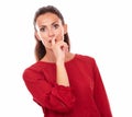 Adult brunette wondering with mouth gesture Royalty Free Stock Photo