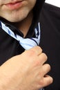 Adult business man adjusting his tie Royalty Free Stock Photo