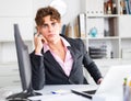 Heavy male manager working with docs in white room Royalty Free Stock Photo