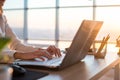 Adult businesswoman working at home using computer, studying business ideas on a pc screen on-line. Royalty Free Stock Photo