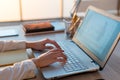 Adult businesswoman working at home using computer, studying business ideas on a pc screen Royalty Free Stock Photo