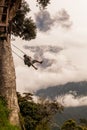 Adult Caucasian Man Swinging On A Swing In Banos De Agua Santa