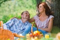 Adult couple picnicking