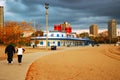 An adult couple walks on a path at North Avenue Beach Chicago