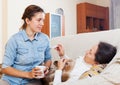 Adult daughter caring for sick mother