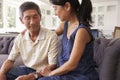 Adult Daughter Talking To Depressed Father At Home Royalty Free Stock Photo