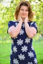 Adult elegant woman on the nature in summer