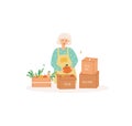 Adult farmer woman packaging fresh vegetables
