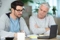 adult father and son discuss acount and financial Royalty Free Stock Photo