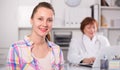 Adult female doctor leading medical appointment Royalty Free Stock Photo