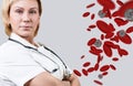 Adult female doctor near coronavirus in blood.