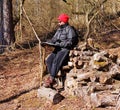 Adult female Hiker reading a Map Royalty Free Stock Photo