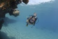 Adult Female scuba diver in bikini Royalty Free Stock Photo