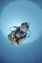 Adult Female scuba diver in bikini Royalty Free Stock Photo
