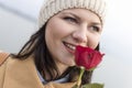 Portrait of an adult girl smelling a rose Royalty Free Stock Photo