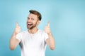 Adult guy showing thumbs up and smiling wide Royalty Free Stock Photo