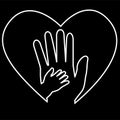 Adult Hand and Baby Hand at Love Shape white at black background Royalty Free Stock Photo