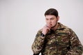 History of Ukraine Adult handsome man 35 years old Military man in uniform sitting and smoking He has rings on his